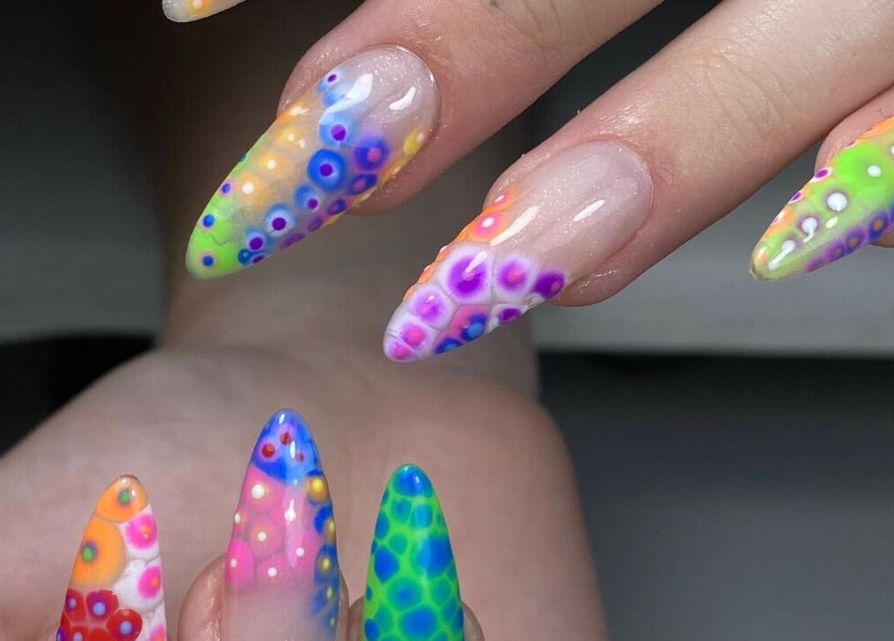 Colorful nail designs showcasing vibrant patterns at Elegancenail Studio, Arndell Park, New South Wales, AU.