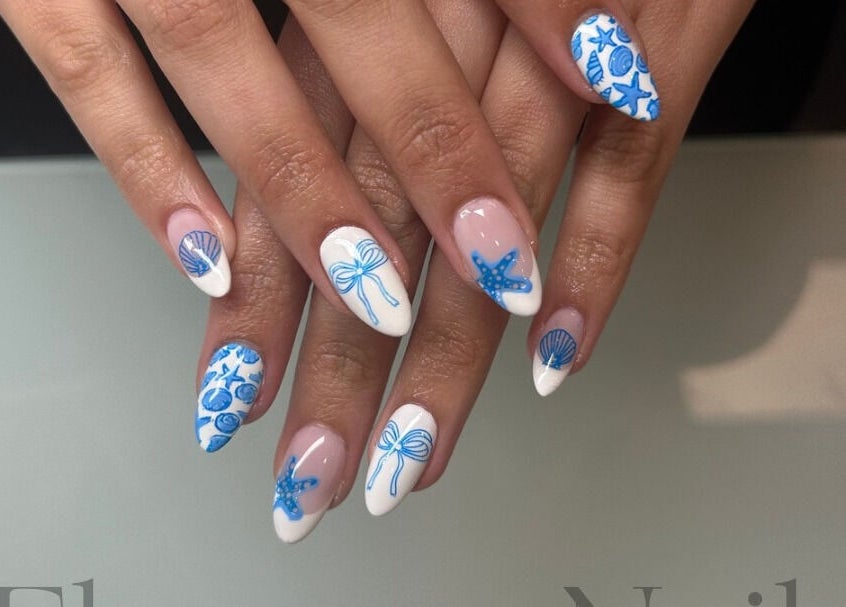Blue and white nautical-themed nail art design at Elegancenail Studio, Arndell Park, New South Wales, AU.