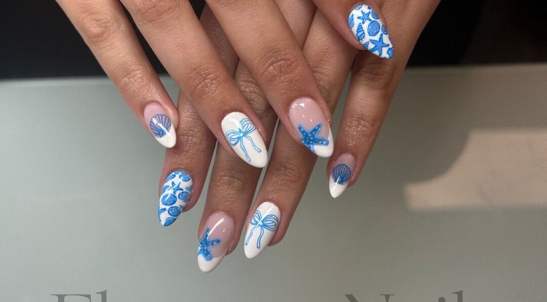 Blue and white nautical-themed nail art design at Elegancenail Studio, Arndell Park, New South Wales, AU.