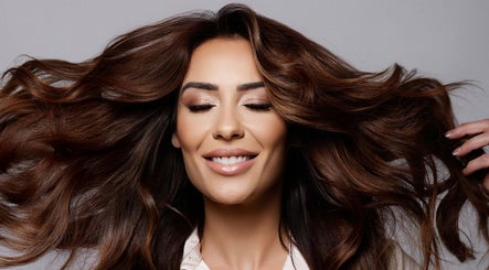 Luxurious hair styling at Privé Hairdressing in Naxxar, MT. Experience sleek, flowing locks.