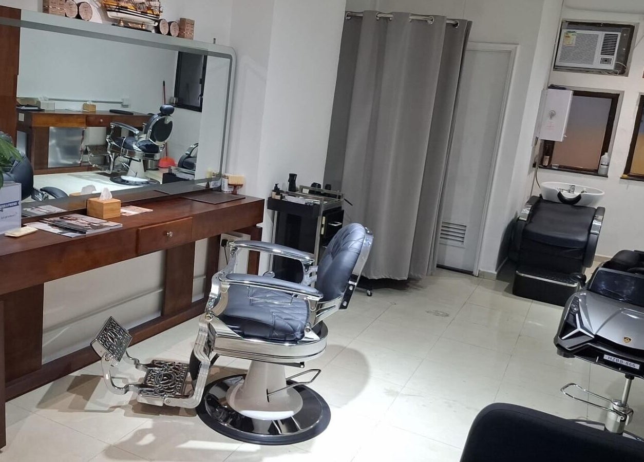 Elegant barber chair and styling station at Barberia e Sartoria Italiana, Hong Kong Island, Hong Kong Island, HK.