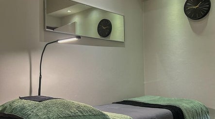 Cozy treatment room at Faithful Aesthetics, Pretoria, Gauteng, ZA with stylish lighting and decor.