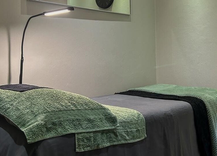 Peaceful treatment room at Faithful Aesthetics, Pretoria, Gauteng, ZA, featuring a comfortable massage table.