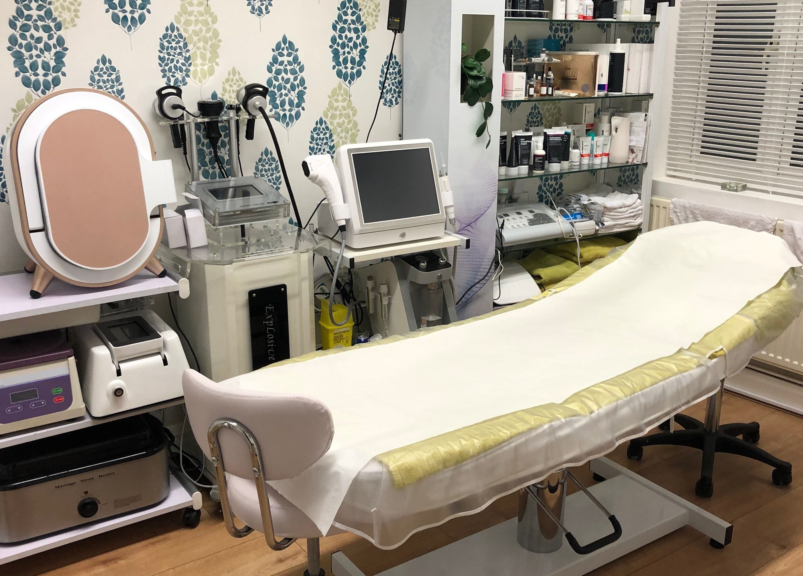 Modern beauty treatment room at Real Beauty in Hampton, England, GB with advanced equipment and soothing decor.