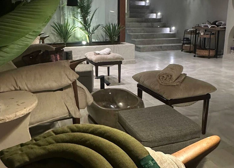 Relaxing lounge at Joyous Hands Spa in Riyadh, Riyadh Province, SA with plush seating and warm lighting.