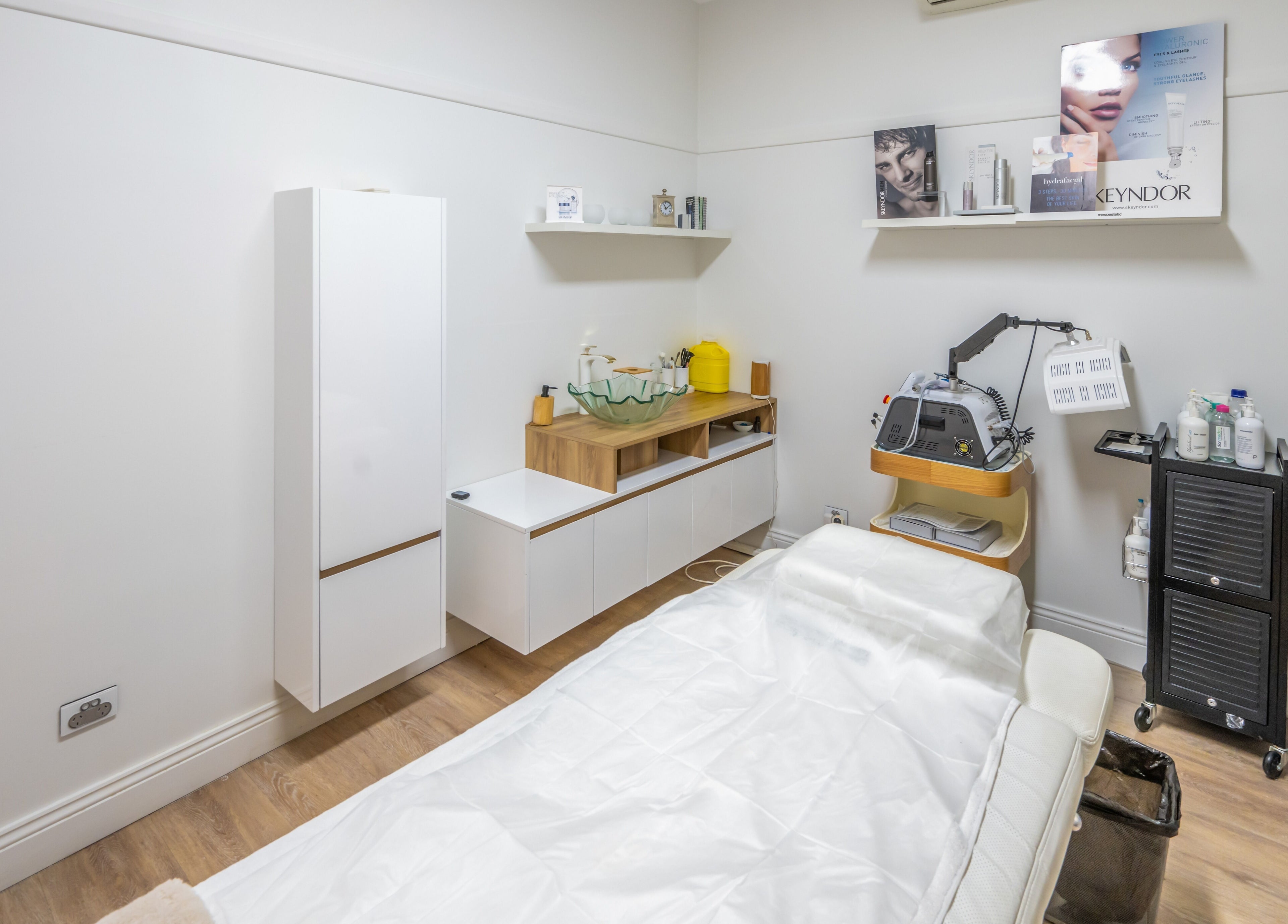 Relaxing treatment room at My Skinic, Melbourne, Victoria, AU, with modern decor and spa equipment.