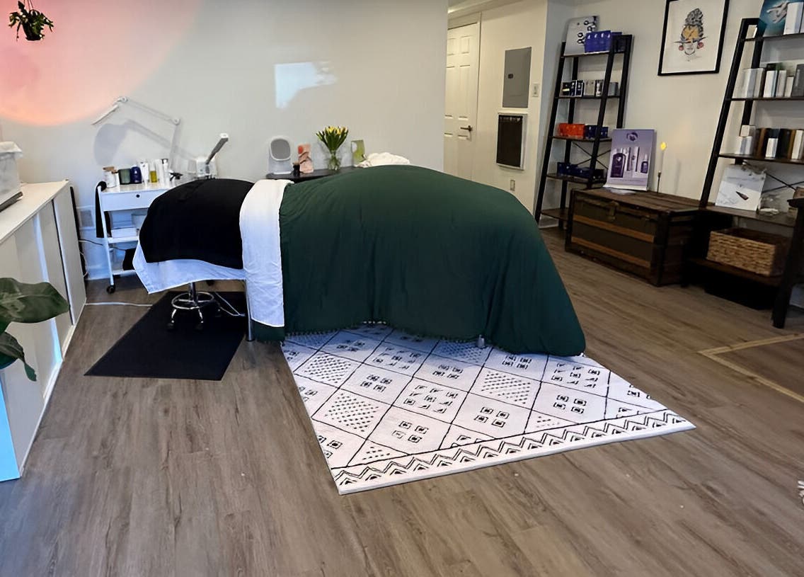 Cozy treatment room at Glow Studio Skin & Beauty in Hamilton, Ontario, CA with relaxing decor.