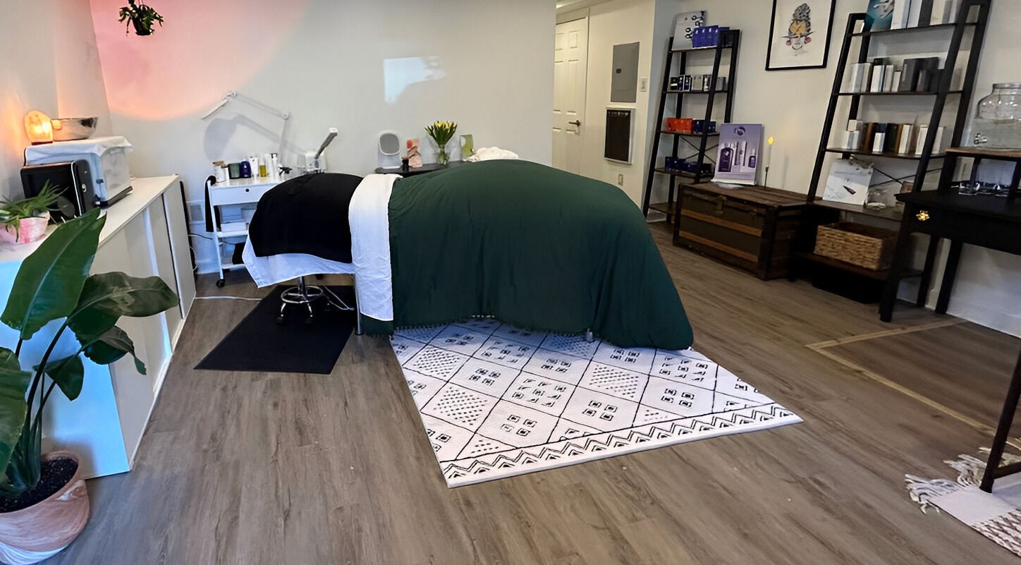 Cozy treatment room at Glow Studio Skin & Beauty in Hamilton, Ontario, CA with relaxing decor.