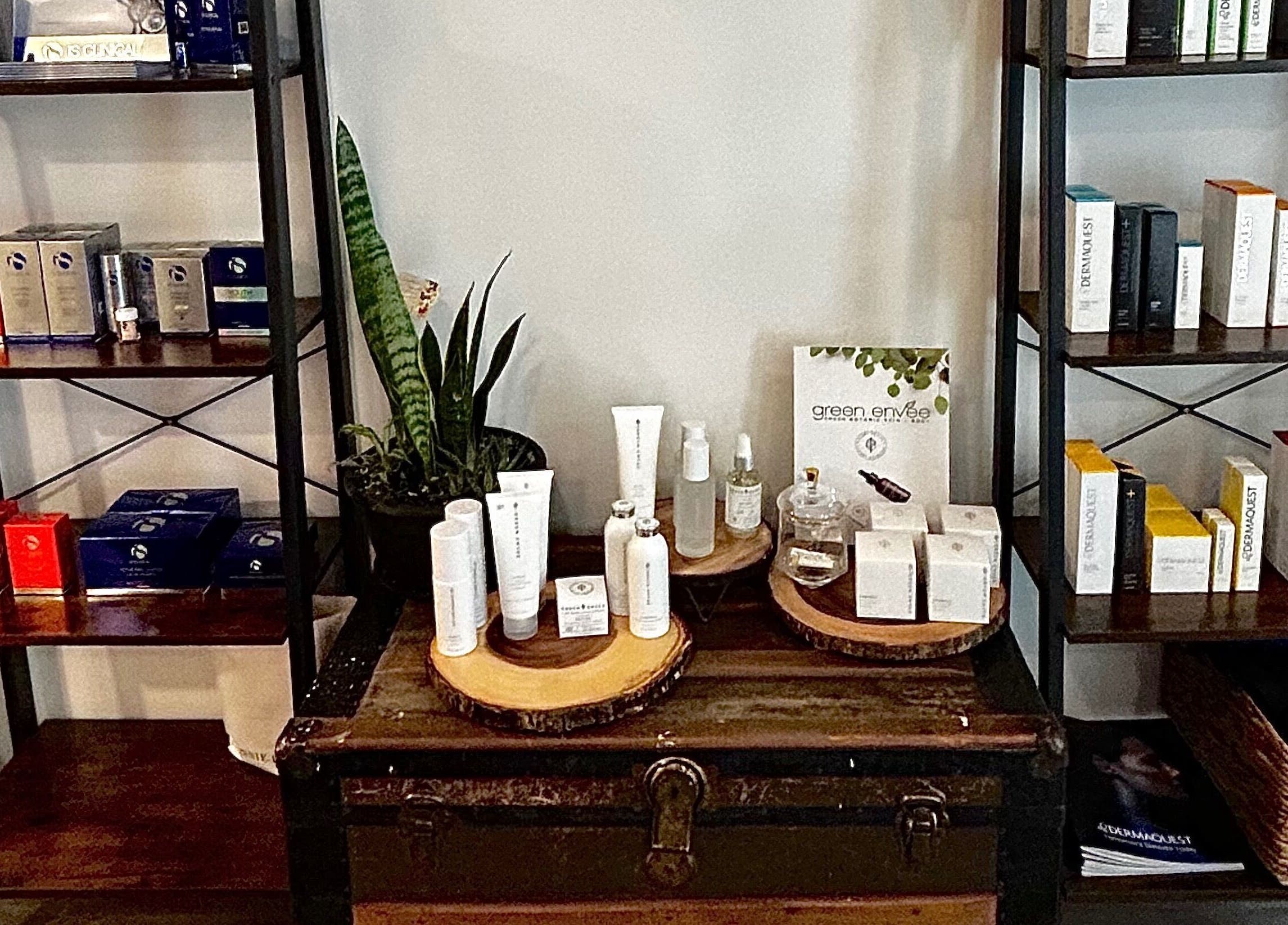 Product display at Glow Studio Skin & Beauty, Hamilton, Ontario, CA featuring skincare and wellness items.