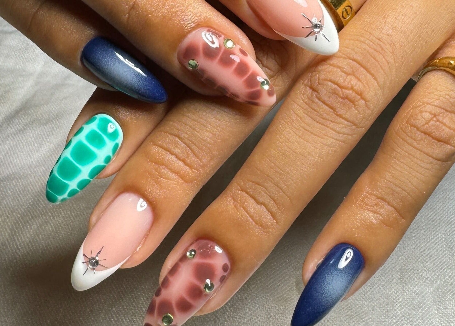 Intricate nail art at The Rustic Sun - Berawa, Bali, Bali, ID showcasing vibrant colors and unique patterns.