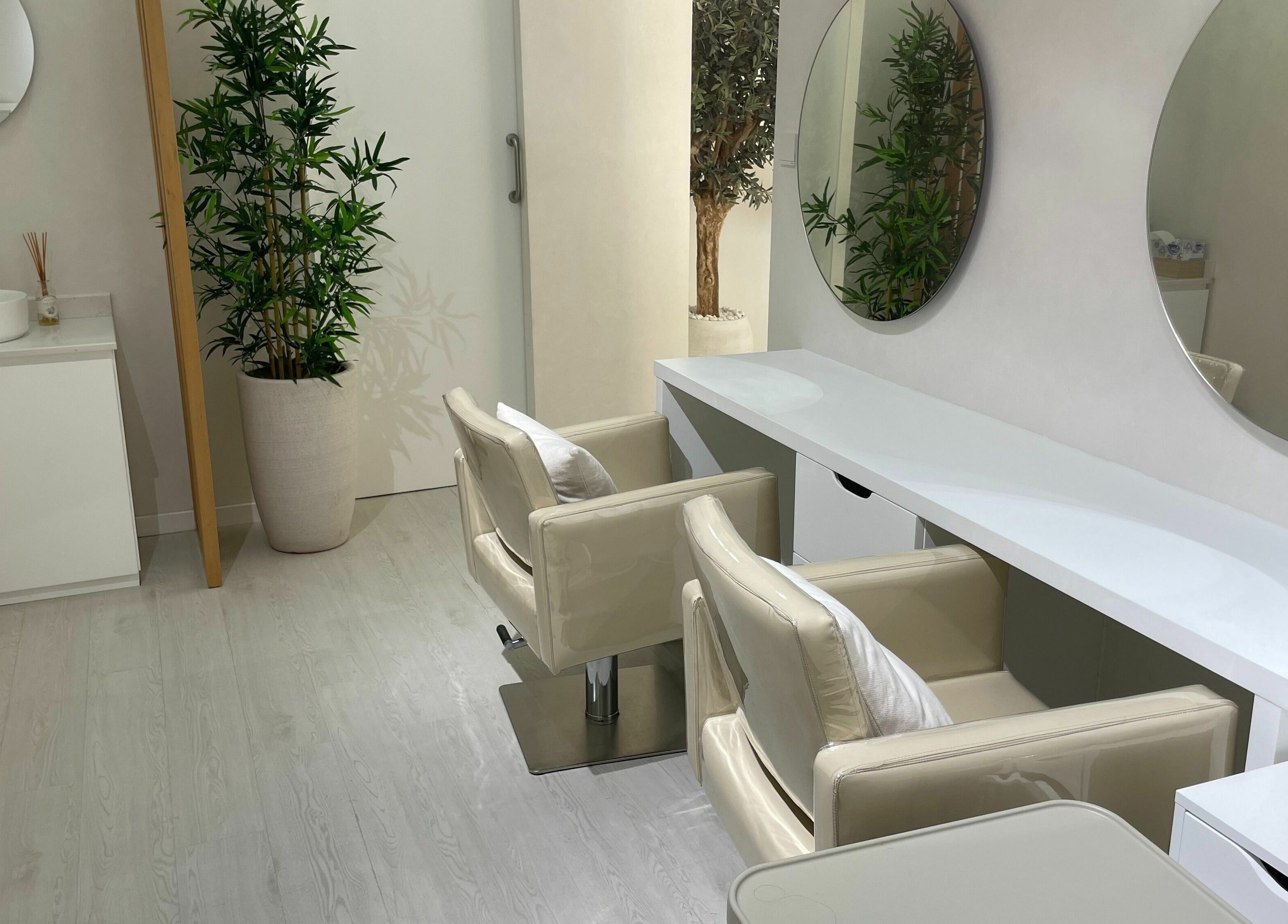 Elegant salon interior at Beauty Stories Dmcc, Dubai, Dubai, AE with modern chairs and minimalist decor.