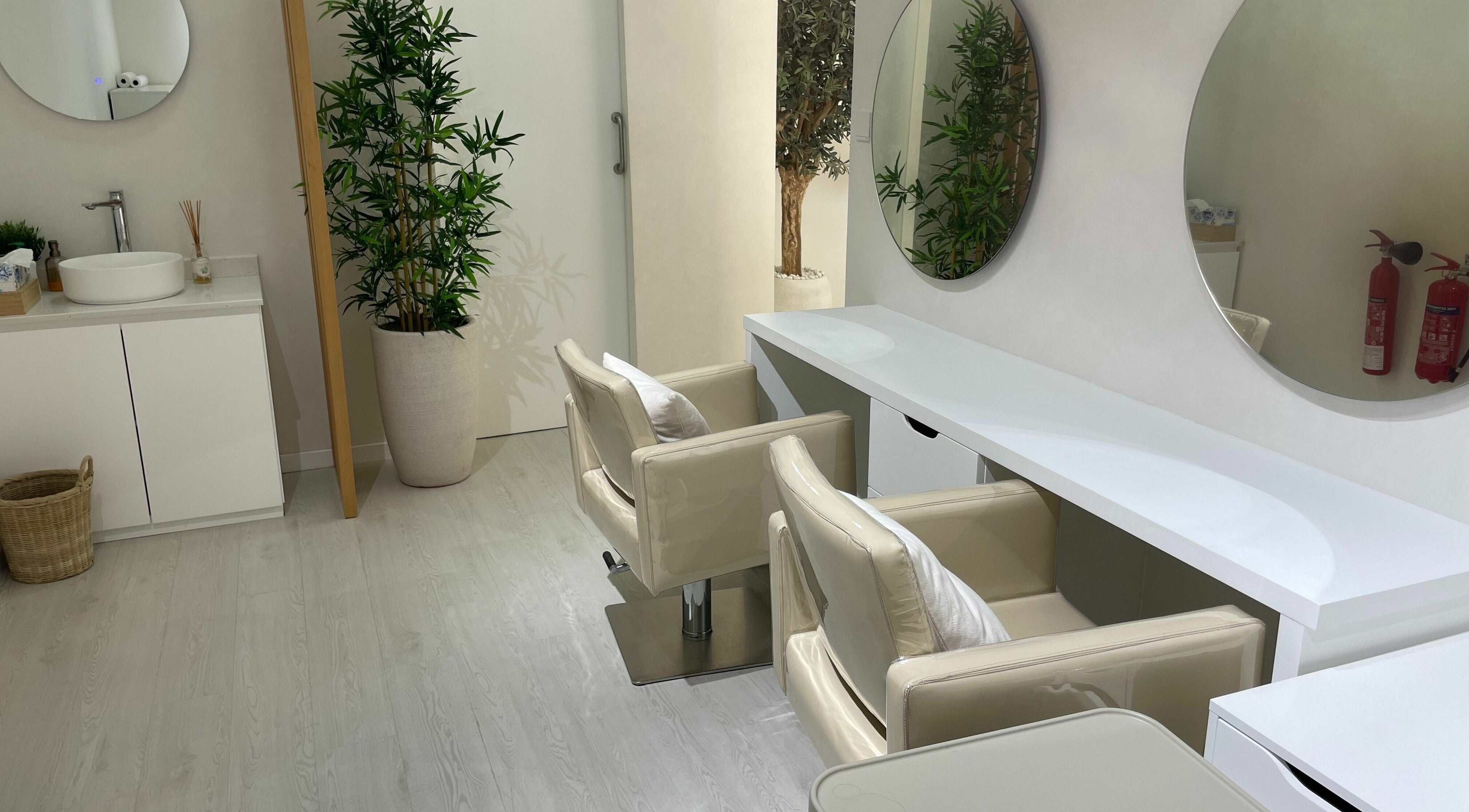 Elegant salon interior at Beauty Stories Dmcc, Dubai, Dubai, AE with modern chairs and minimalist decor.