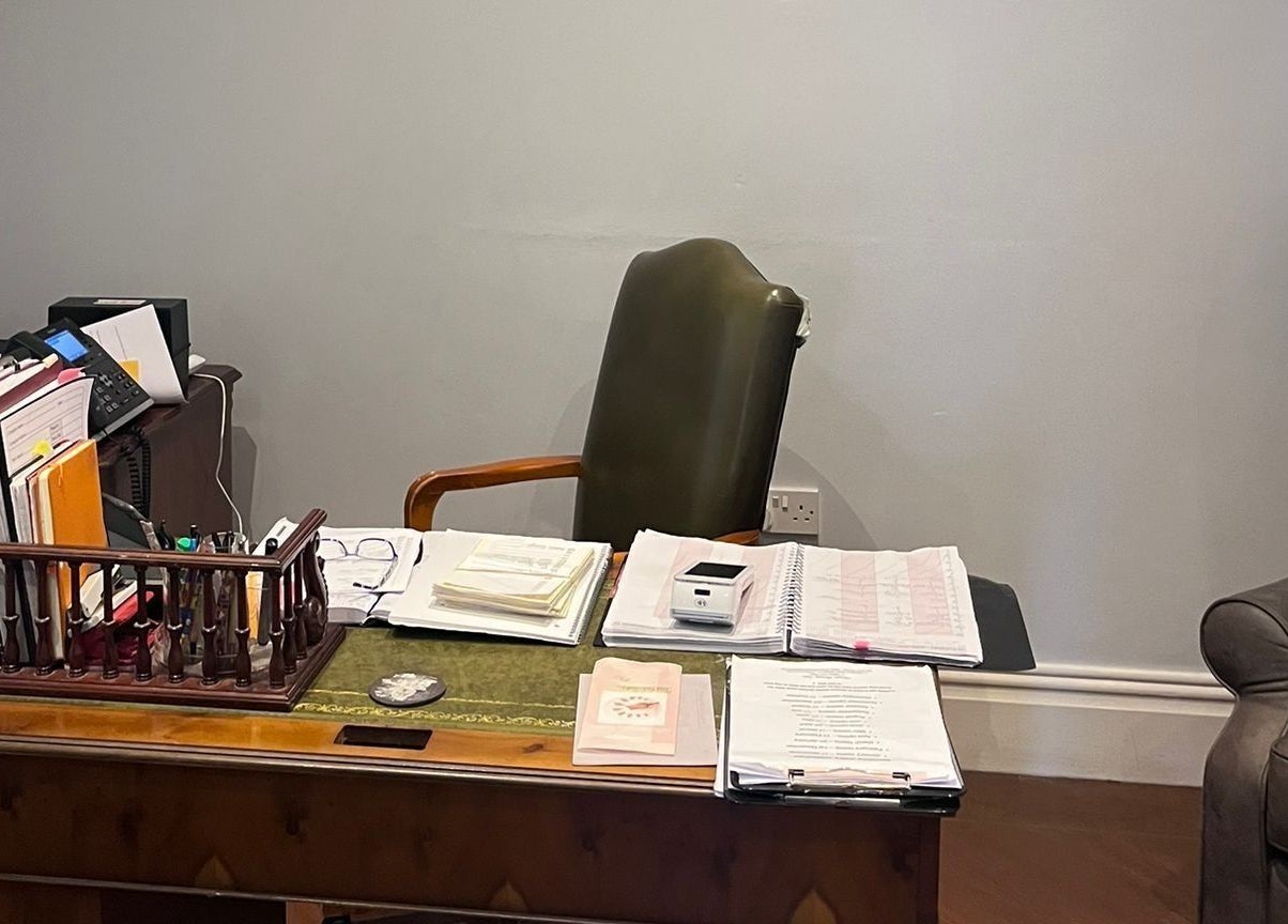 Oaktree Parc Clinic office desk with papers and chair in Birchgrove, Wales, GB.