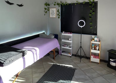 Tranquil spa room at A Touch Of B, Cape Town, Western Cape, ZA, featuring a massage table and soothing decor.