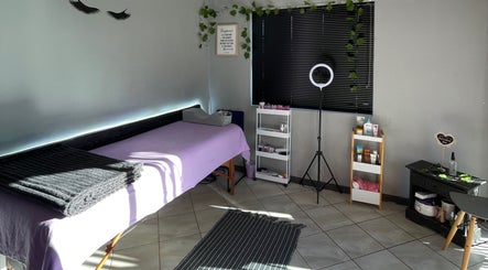 Tranquil spa room at A Touch Of B, Cape Town, Western Cape, ZA, featuring a massage table and soothing decor.