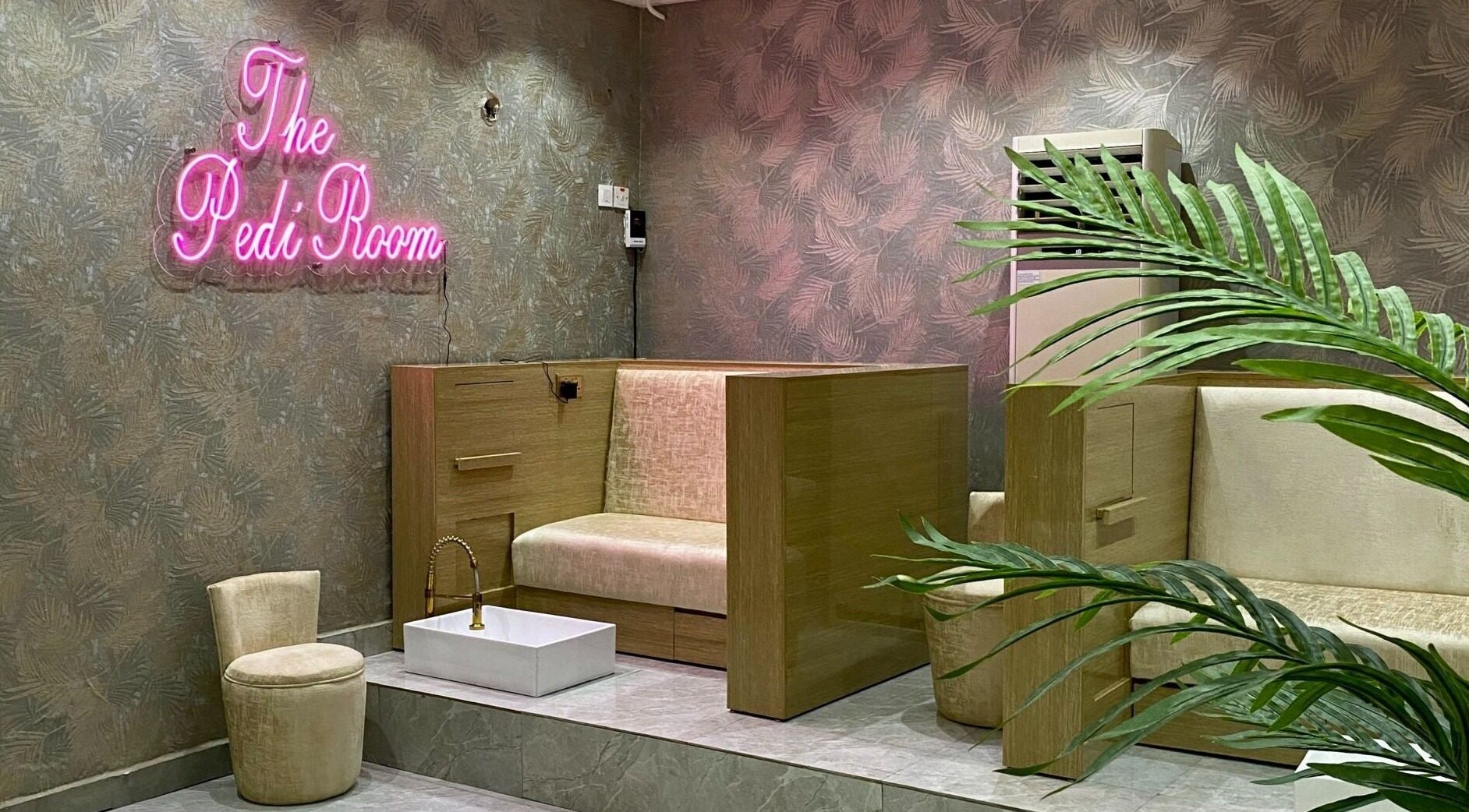 Elegant pedi room at LIOCA ESTHETICS, SPA & SALON, Lagos, Lagos, NG featuring plush seating and a serene vibe.