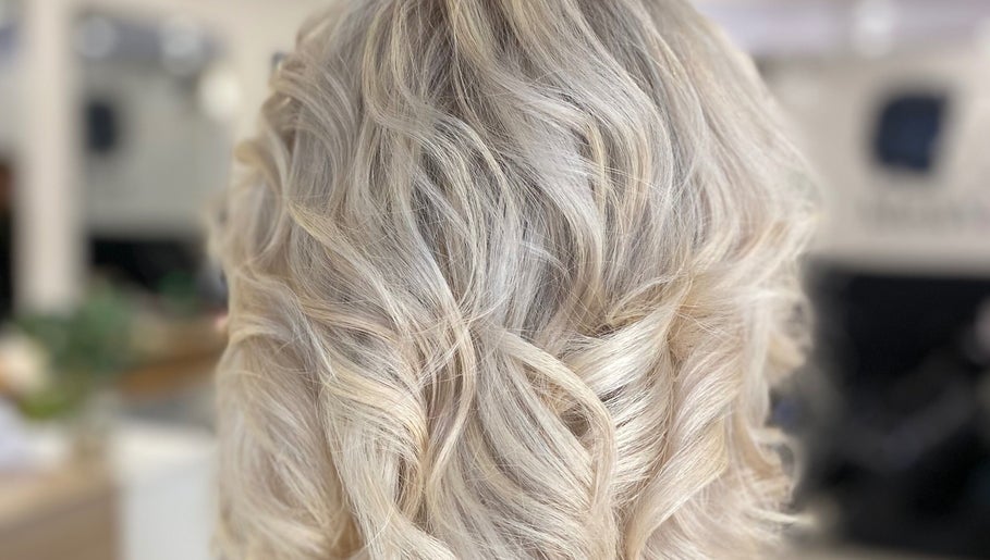Blonde wavy hairstyle at Me and You Hair Salon in Corrimal, New South Wales, AU, showcasing fine texture.