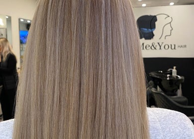 Smooth blonde hair at Me and You Hair Salon, Corrimal, New South Wales, AU. Expert styling service.