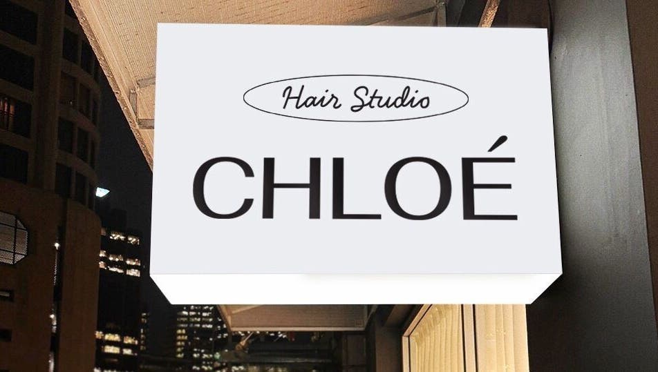 Chloe Hair salon sign at night in Auckland, Auckland, NZ, showcasing modern elegance and style.