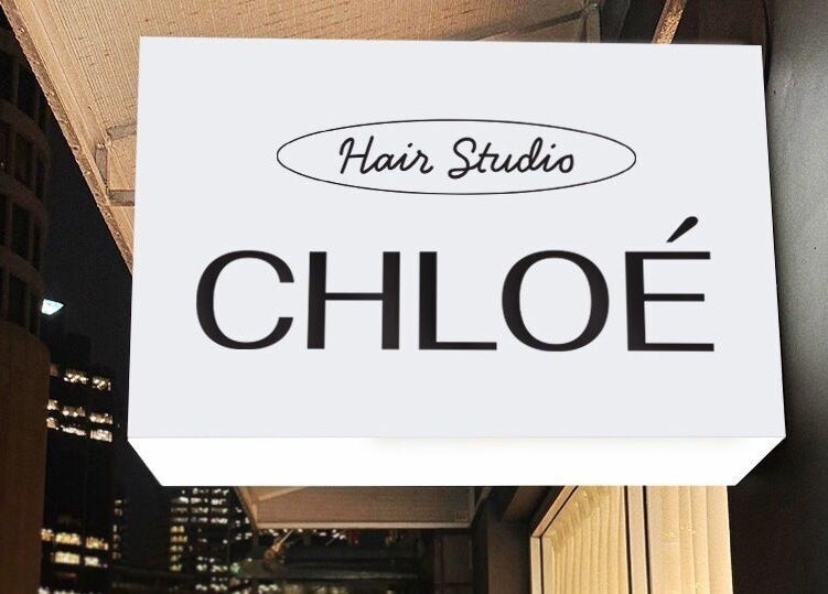 Chloe Hair salon sign at night in Auckland, Auckland, NZ, showcasing modern elegance and style.