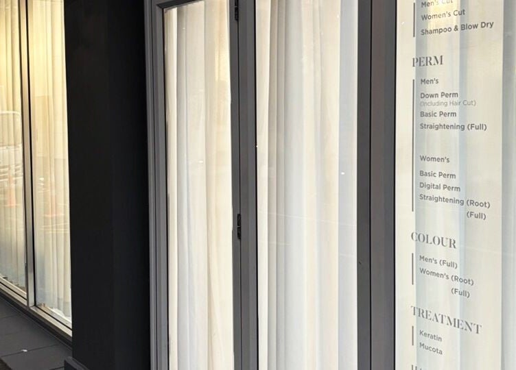 Chloe Hair's stylish exterior with service menu in Auckland, Auckland, NZ.