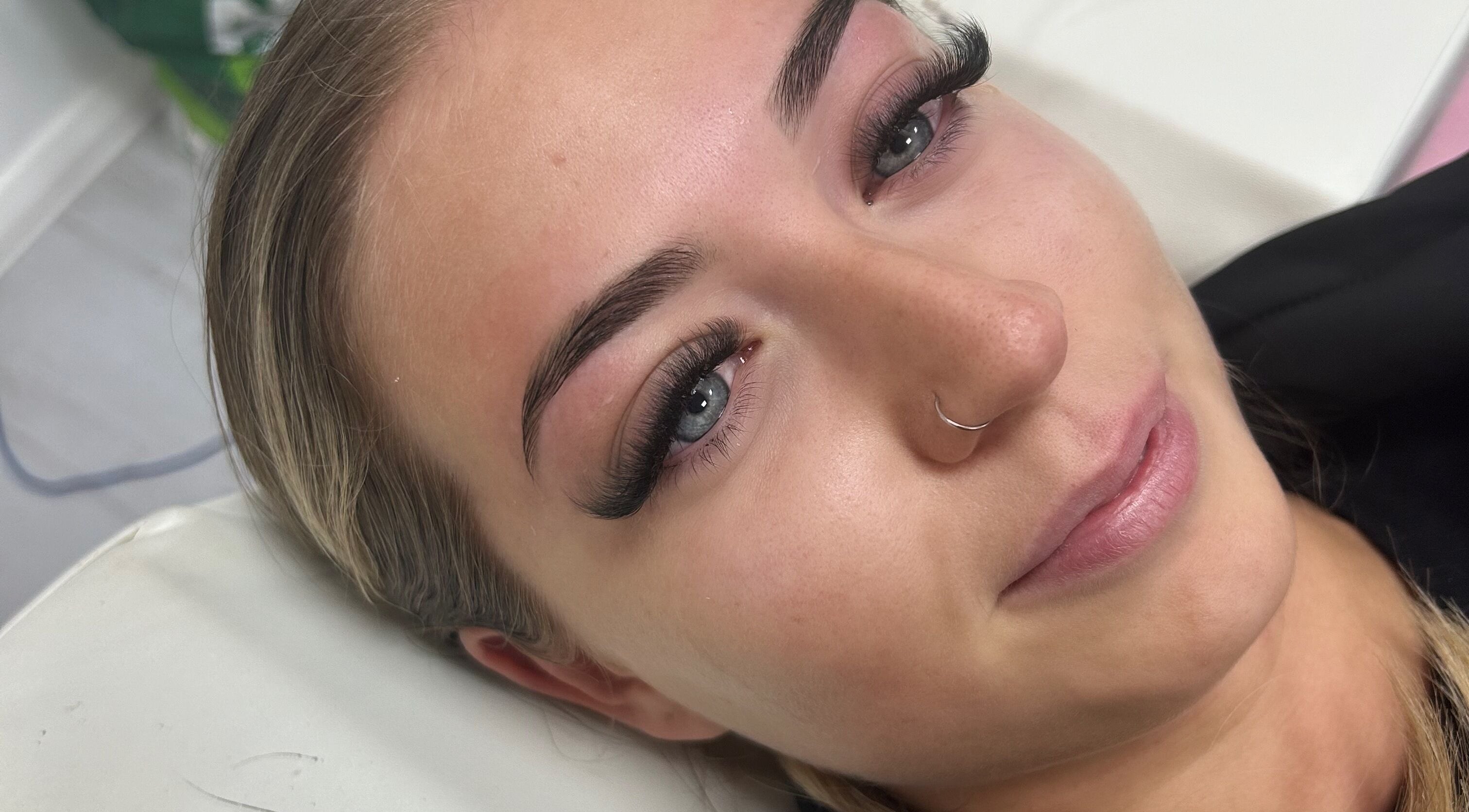 Close-up of eyelash extensions at House of Belle, Rushden, England, GB, showcasing expert beauty service.