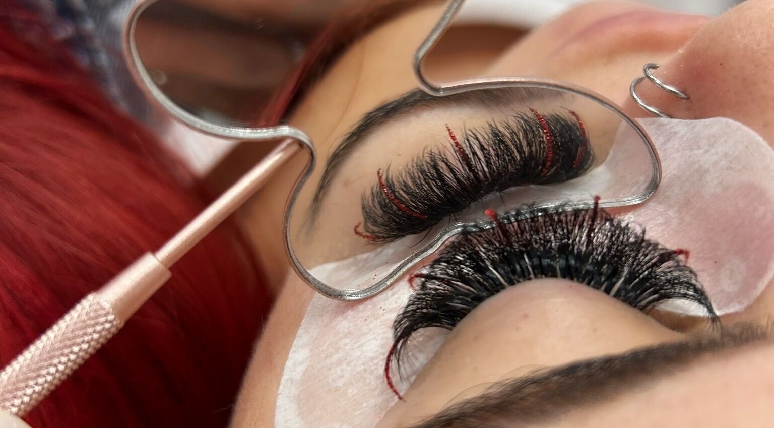 Intricate eyelash extensions applied at House of Belle, Rushden, England, GB.