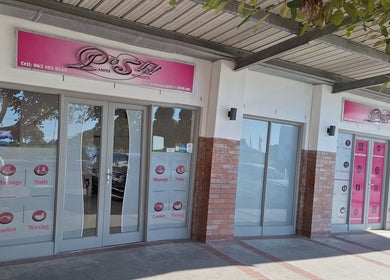 Posh Pamper Specialists entrance in Cape Town, Western Cape, ZA, showcasing glass doors and pink signage.