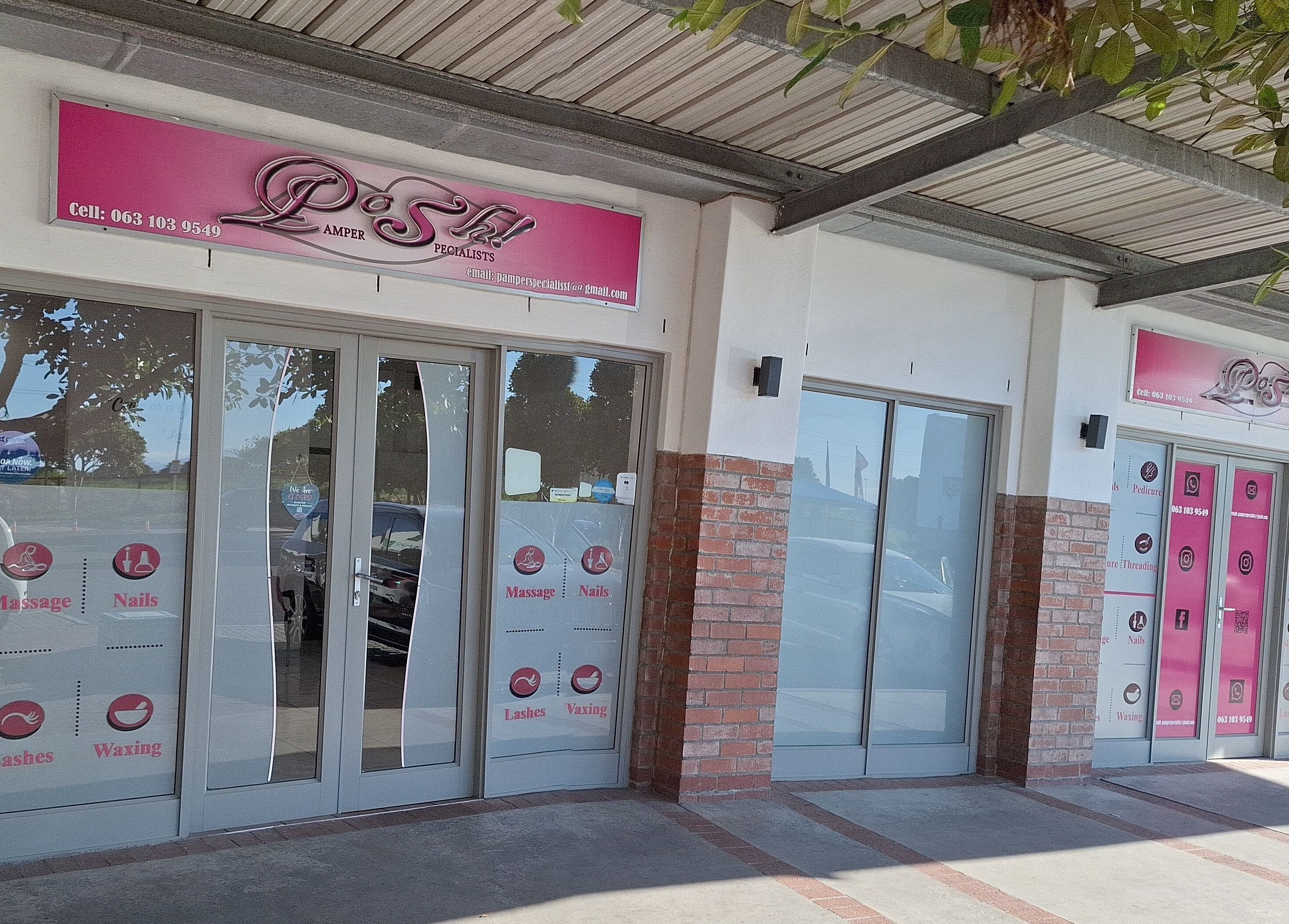 Entrance of Posh Pamper Specialists in Cape Town, Western Cape, ZA, showcasing a modern glass facade.