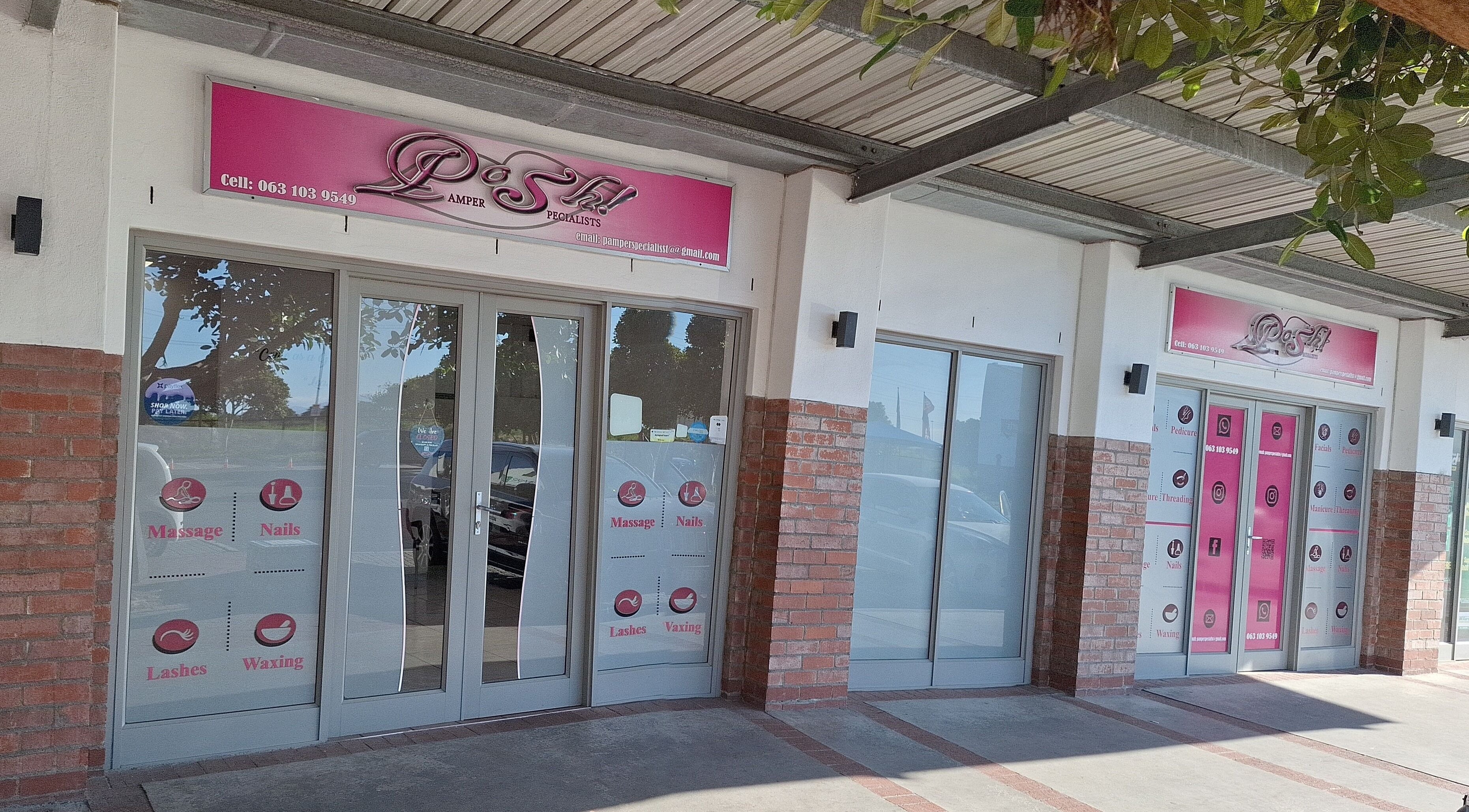 Entrance of Posh Pamper Specialists in Cape Town, Western Cape, ZA, showcasing a modern glass facade.