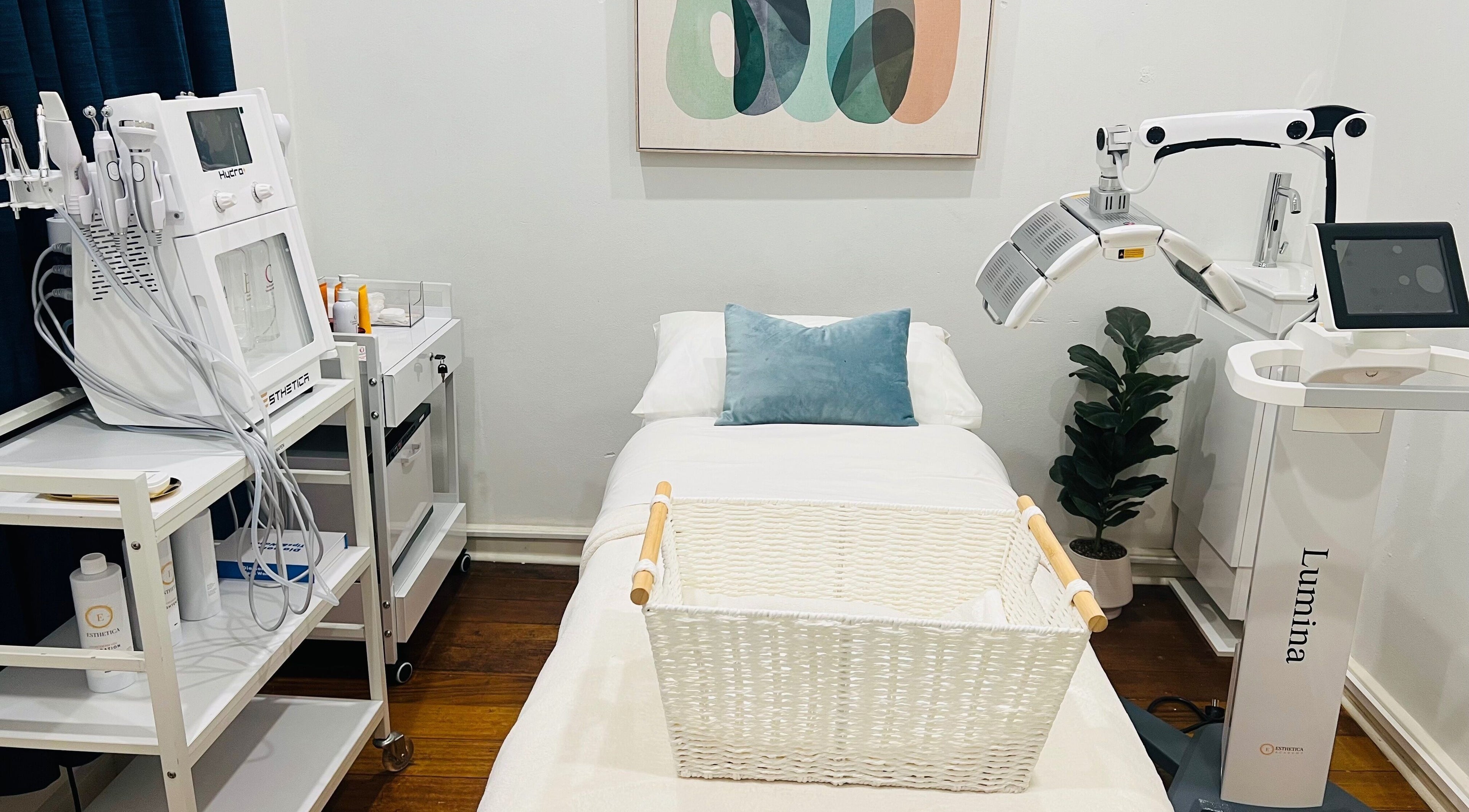 Modern treatment room at Kew Skin Therapy, Melbourne, Victoria, AU, featuring advanced skincare equipment.