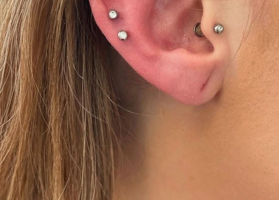 Stylish ear piercings at Rejuv by V in Newcastle, England, GB offering trendy wellness enhancements.