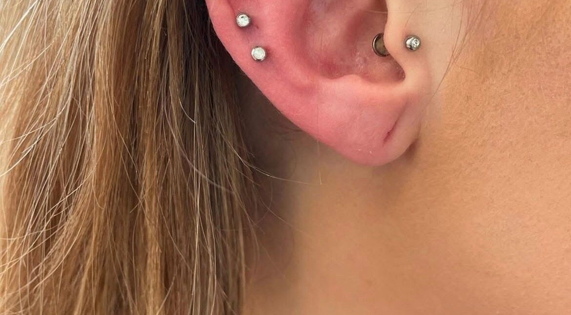 Stylish ear piercings at Rejuv by V in Newcastle, England, GB offering trendy wellness enhancements.