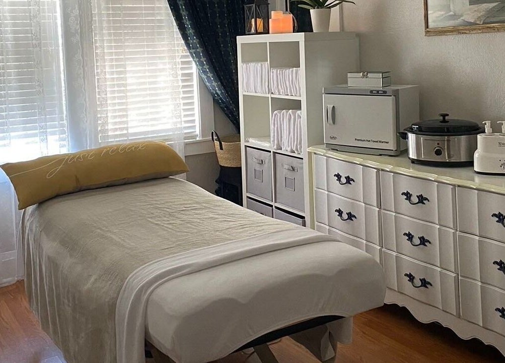 Relaxing massage room at Cindy's Amazing Massage and Spa, Sarasota, Florida, US, featuring comfy table and decor.