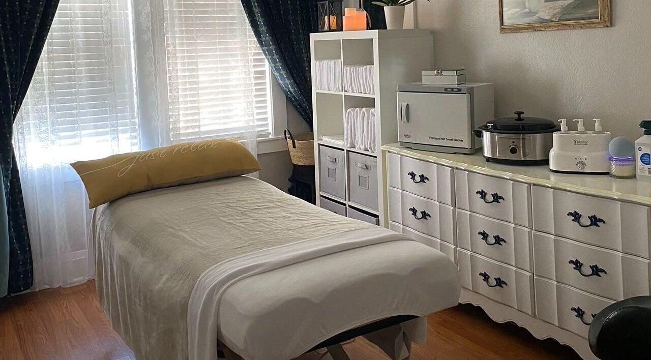 Relaxing massage room at Cindy's Amazing Massage and Spa, Sarasota, Florida, US, featuring comfy table and decor.