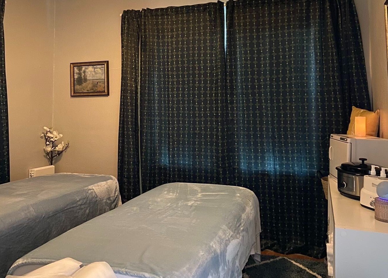 Cozy massage room at Cindy's Amazing Massage and Spa, Sarasota, Florida, US. Perfect for relaxation.