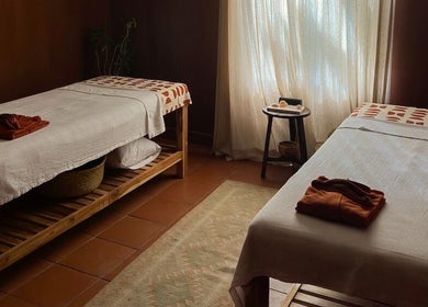 Relaxation room with massage tables at Alam Wellness Bali, Denpasar, Bali, ID.