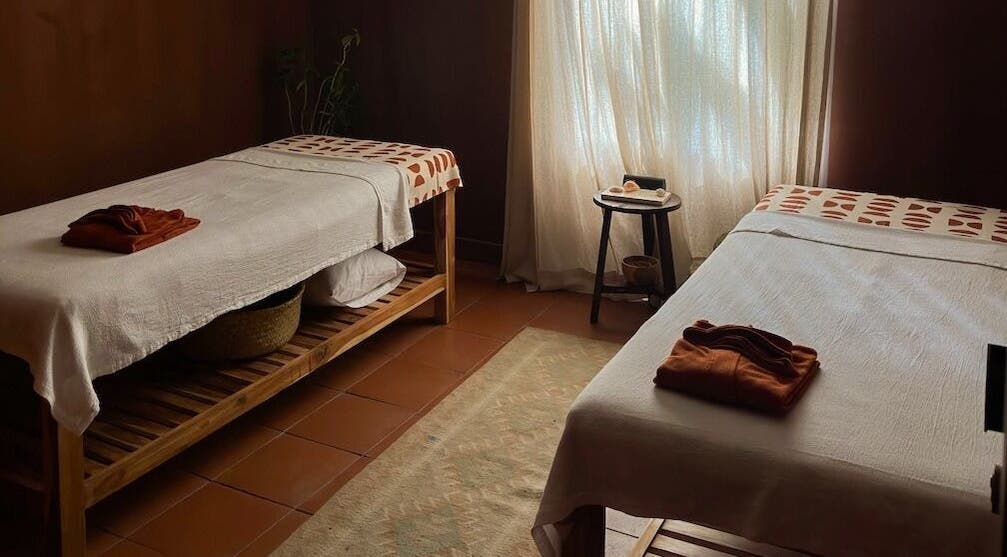 Relaxation room with massage tables at Alam Wellness Bali, Denpasar, Bali, ID.
