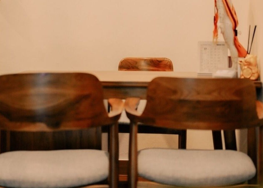 Cozy consultation room at Acupuncture Bali, Nusa Dua, featuring elegant wooden chairs. Located in Bali, Bali, ID.