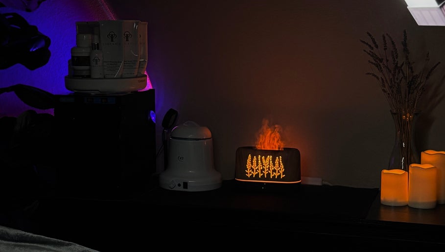 Relaxing spa setup at The Inspired Beauty, Christchurch, NZ with candles and aromatherapy diffuser.