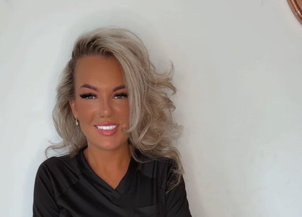 Smiling individual at Yasmin kitchen aesthetics at HD Beauty in Fareham, England, GB with styled blonde hair.