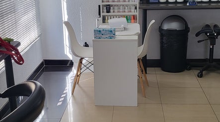Manicure station at Sparkle Nail Studio, Roodepoort, Gauteng, ZA, showcasing a modern, sunny setting.