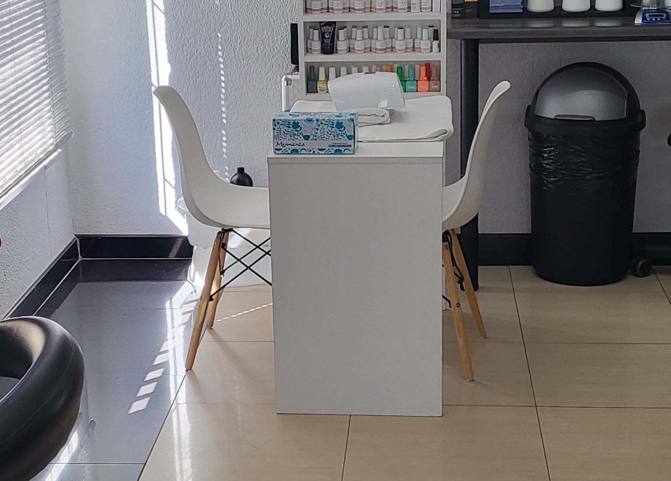 Modern manicure station at Sparkle Nail Studio in Roodepoort, Gauteng, ZA with elegant decor.