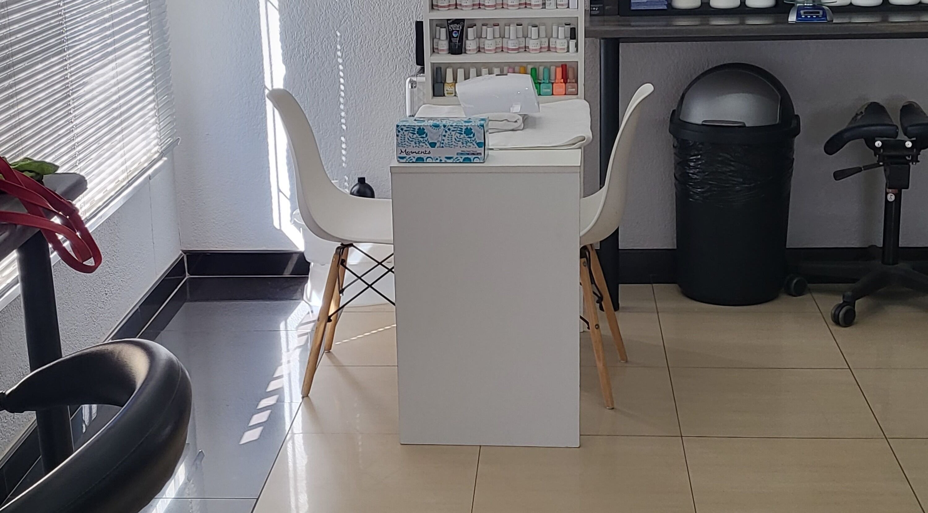 Modern manicure station at Sparkle Nail Studio in Roodepoort, Gauteng, ZA with elegant decor.