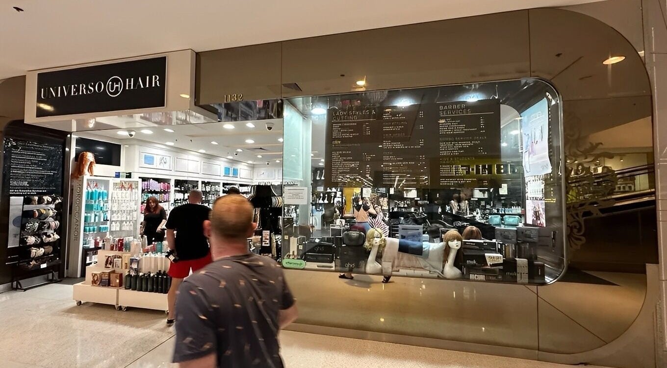 Exterior of Universohair in Melbourne, AU showcasing stylish salon interior and products.