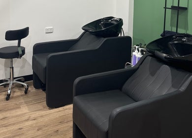 Sleek wash stations at Daisy Wu - Studio Dejavu in Melbourne, Victoria, AU, highlighting modern salon features.