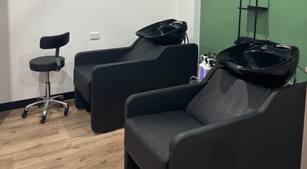 Sleek wash stations at Daisy Wu - Studio Dejavu in Melbourne, Victoria, AU, highlighting modern salon features.