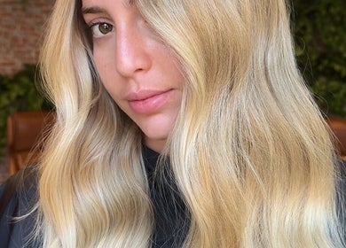 Blonde hair with soft waves styled at Studio DejaWu, Melbourne, Victoria, AU.