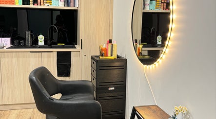 Modern salon setup with illuminated mirror at Studio Deja Wu, Melbourne, Victoria, AU.
