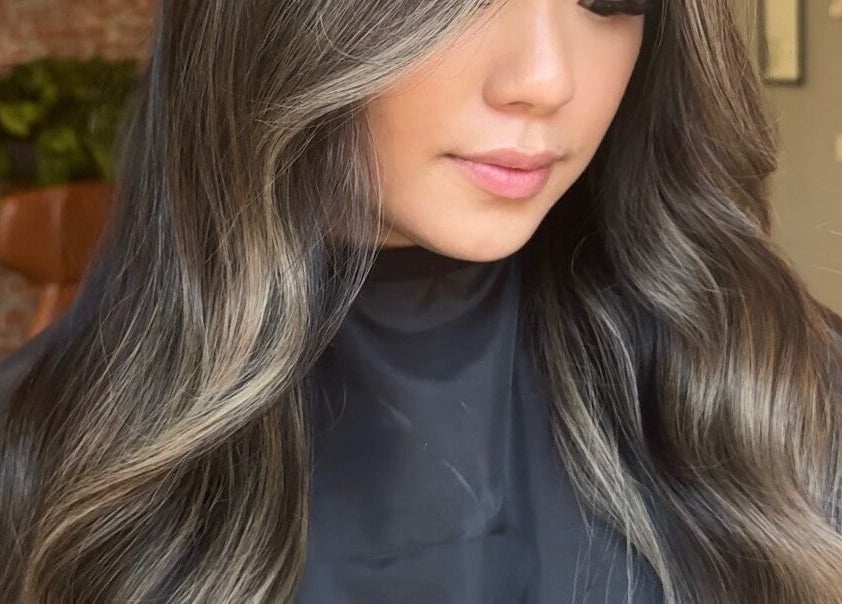 Elegant hair styling at Studio Deja Wu, Melbourne, Victoria, AU. Smooth, luxurious waves add glam appeal.